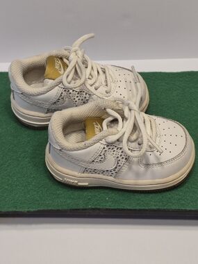 Nike Baby White Leather Sneakers with Gold Logo Accents